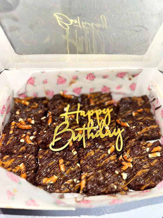 A tray of loaded birthday brownies